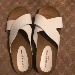 white and beige sandals